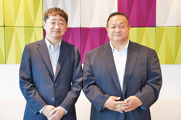 谷典生シニアディレクターと片岡睦国統括部長